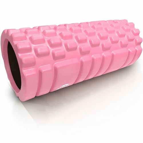 Pink textured foam roller for exercise and massage.