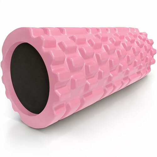 Pink textured foam roller for exercise