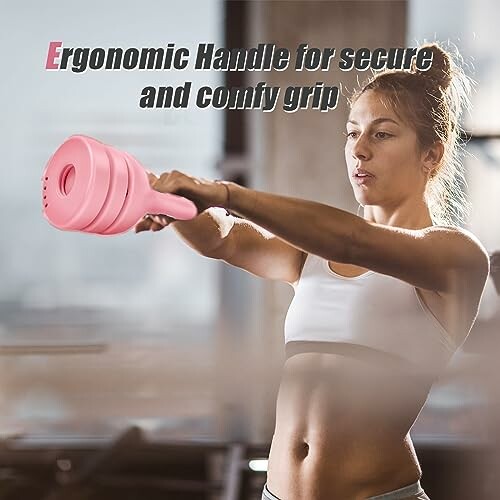 Woman exercising with a pink dumbbell, ergonomic handle for secure grip.